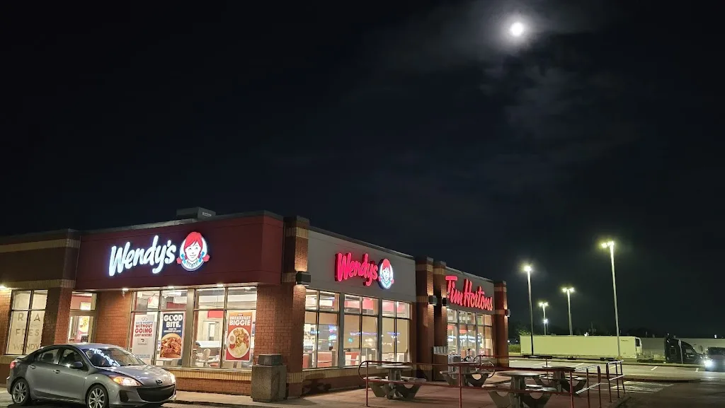 Tim Hortons storefront and interior at 118 South Albion Street, Amherst, NS