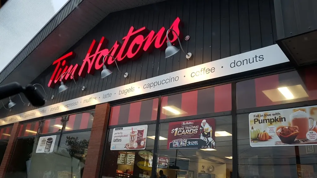 Tim Hortons storefront and interior at 2249 Main St, Reserve Mines, NS