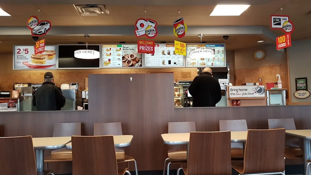 Tim Hortons storefront and interior at 396 Welton St, Sydney, NS