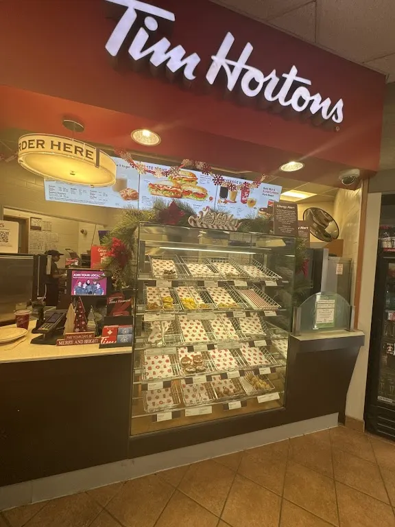 Tim Hortons storefront and interior at 211 Bayly St East, Ajax, ON
