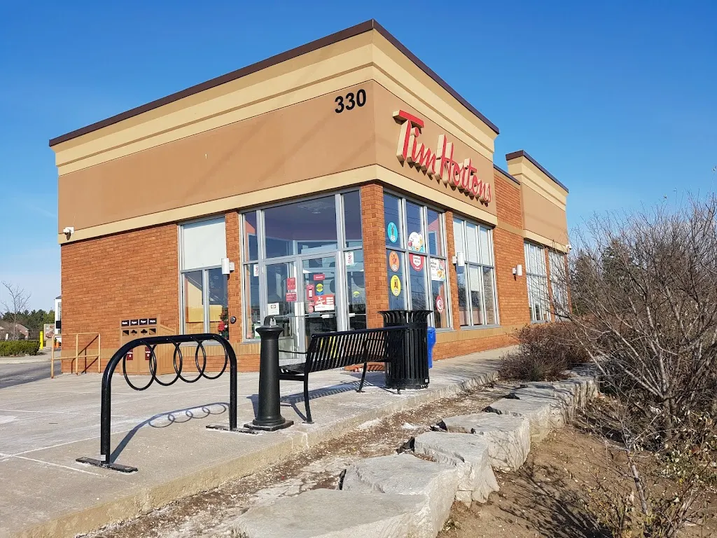 Tim Hortons storefront and interior at 330 Rossland Rd East, Ajax, ON