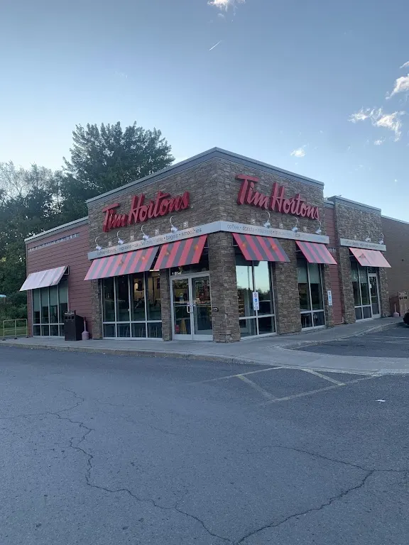 Tim Hortons storefront and interior at 108 County Rd 17 St Phillipe St, Alfred, ON