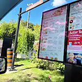 Tim Hortons storefront and interior at 80 Bayfield St, Barrie, ON