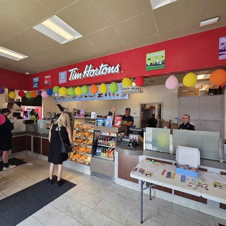 Tim Hortons storefront and interior at 89 Bayfield Main St South, Bayfield, ON
