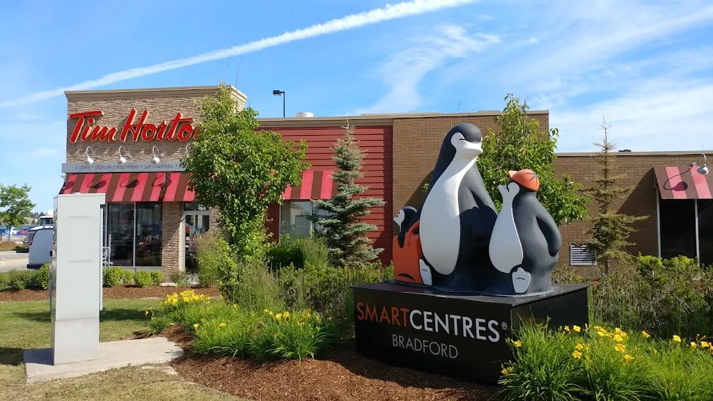 Tim Hortons storefront and interior at 530-544  Holland St W, Bradford, ON