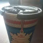 Tim Hortons storefront and interior at 2 Intermodal Dr, Brampton, ON