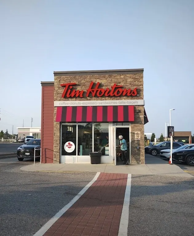 Tim Hortons storefront and interior at 15 Ace Drive, Brampton, ON