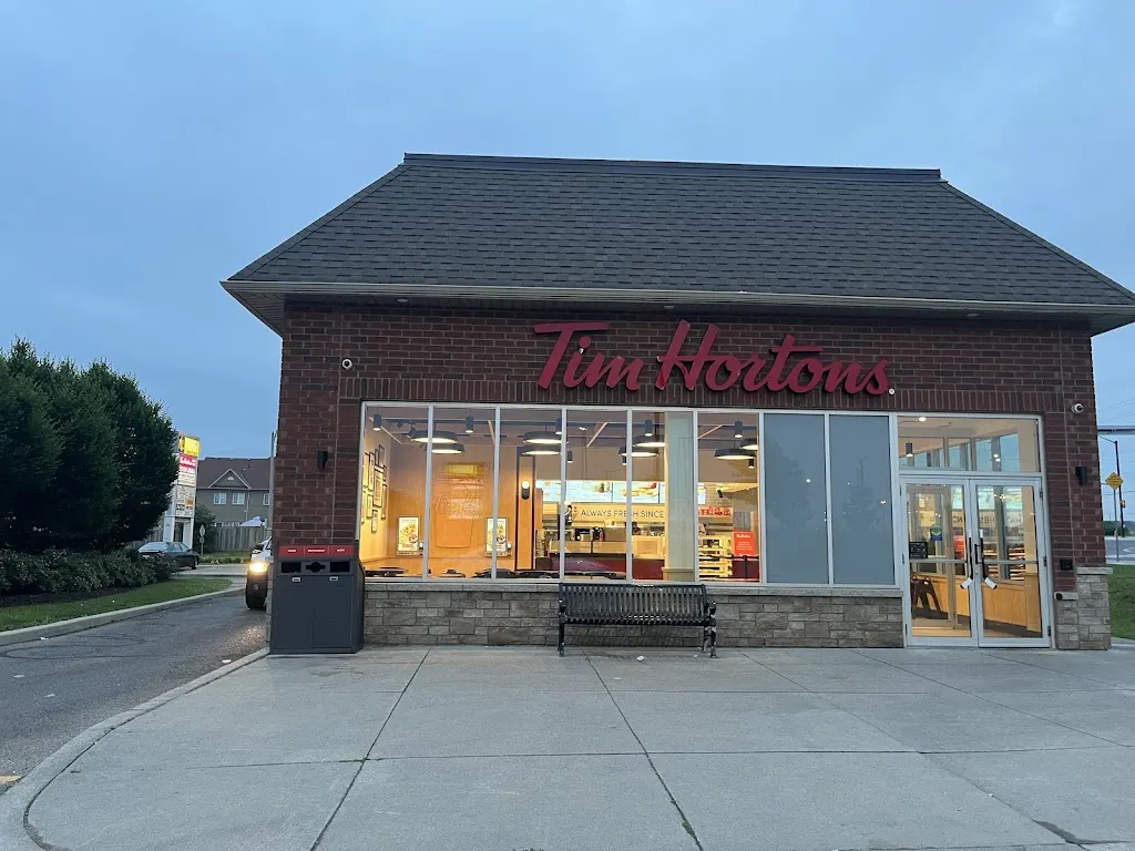 Tim Hortons storefront and interior at 15 Resolution Dr, Brampton, ON