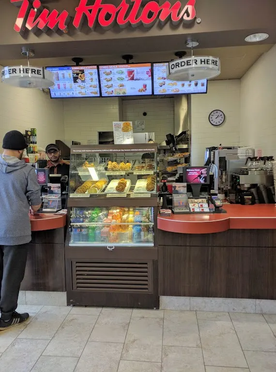 Tim Hortons storefront and interior at 20 Great Lakes Dr, Brampton, ON