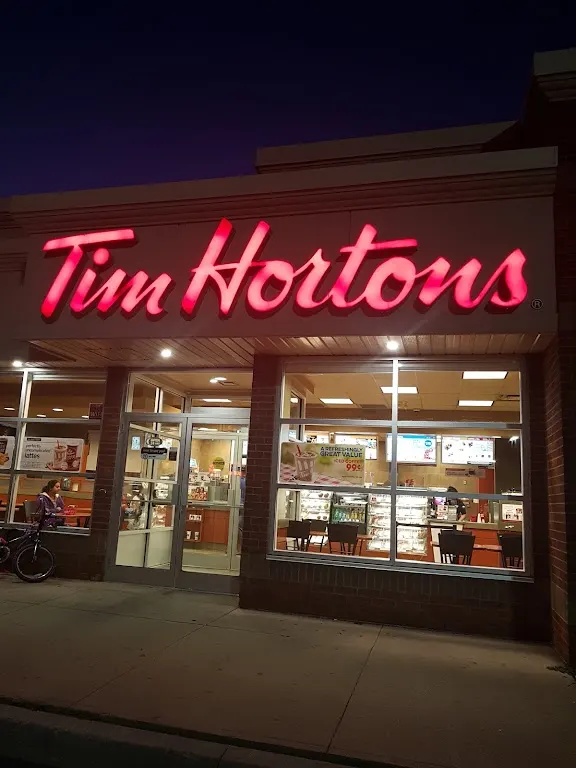 Tim Hortons storefront and interior at 95 Father Tobin Blvd, Brampton, ON