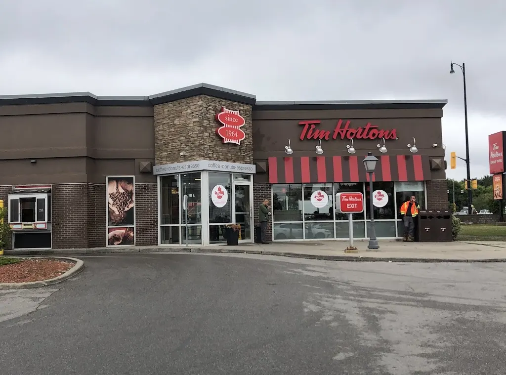 Tim Hortons storefront and interior at 261 Queen St East, Brampton, ON