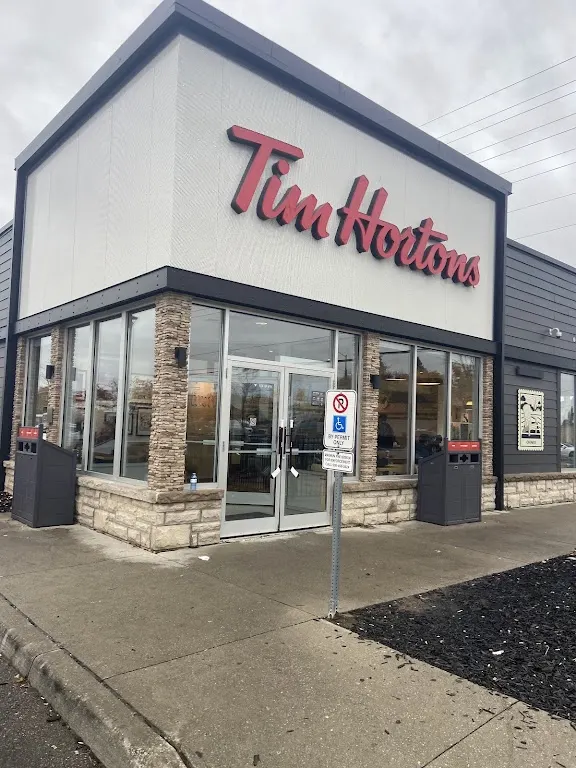 Tim Hortons storefront and interior at 497 Main St South, Brampton, ON