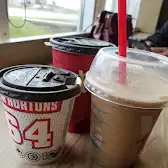 Tim Hortons storefront and interior at 1150 Steeles Ave, Brampton, ON