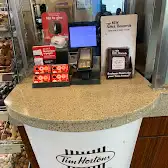 Tim Hortons storefront and interior at 8720 The Gore Rd, Brampton, ON