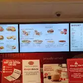Tim Hortons storefront and interior at 1035 Brant St, Burlington, ON