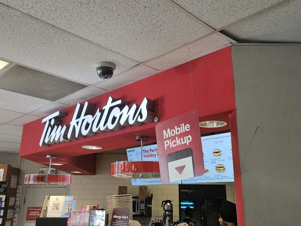 Tim Hortons storefront and interior at 1447 Lakeshore Rd, Burlington, ON