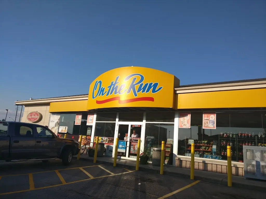 Tim Hortons storefront and interior at 2971 Walkers Line, Burlington, ON