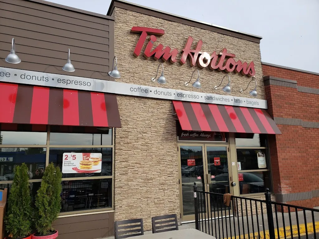 Tim Hortons storefront and interior at 4033 New Street, Burlington, ON