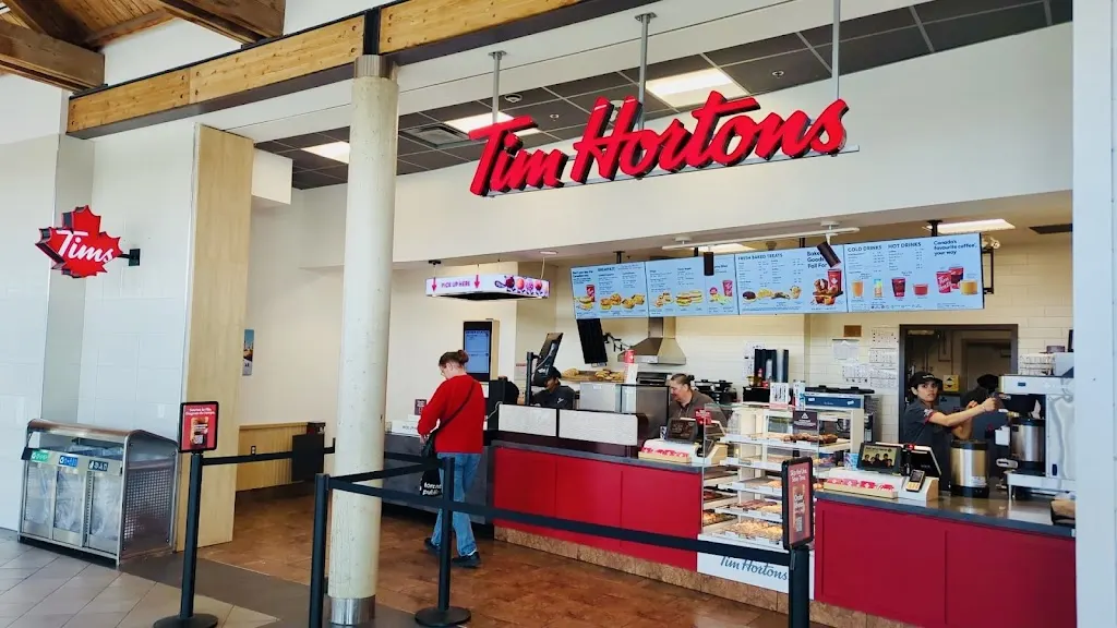 Tim Hortons storefront and interior at Burlington Go - 2101 Fairview St, Burlington, ON