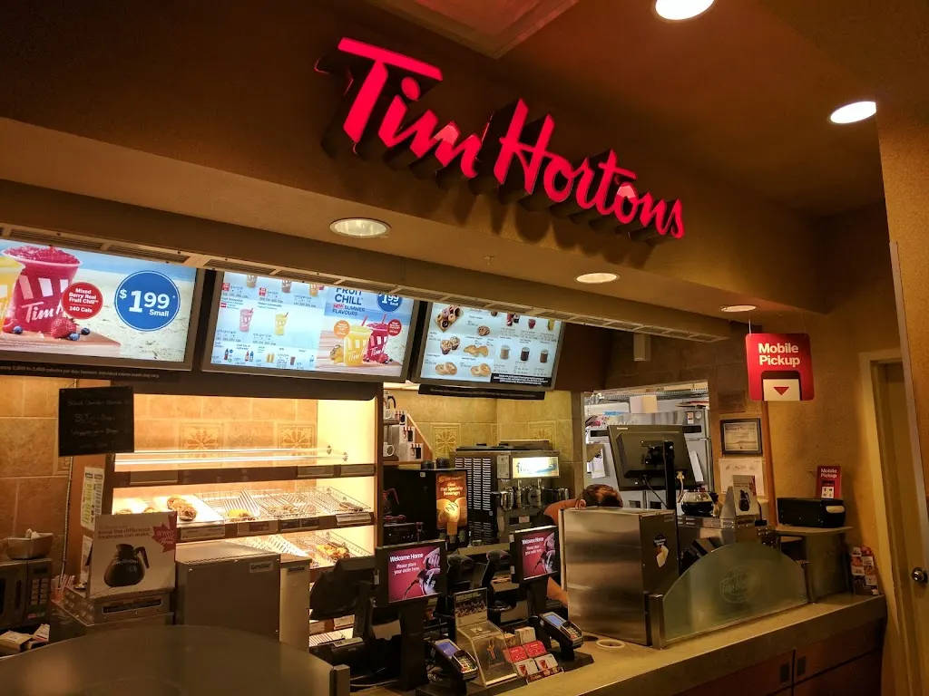 Tim Hortons storefront and interior at 106 Emma St, Chatham, ON