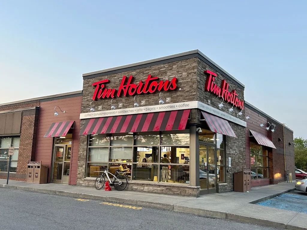 Tim Hortons storefront and interior at 749 William St, Cobourg, ON