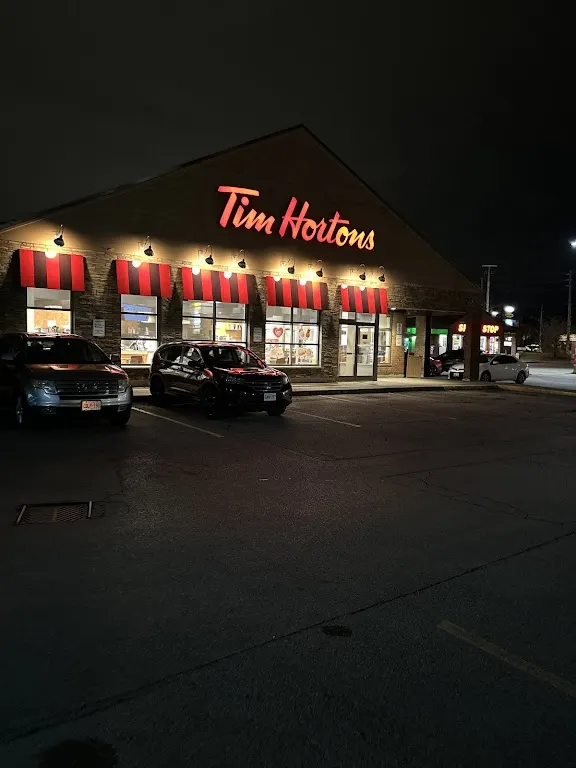 Tim Hortons storefront and interior at 1403 King St E, Courtice, ON