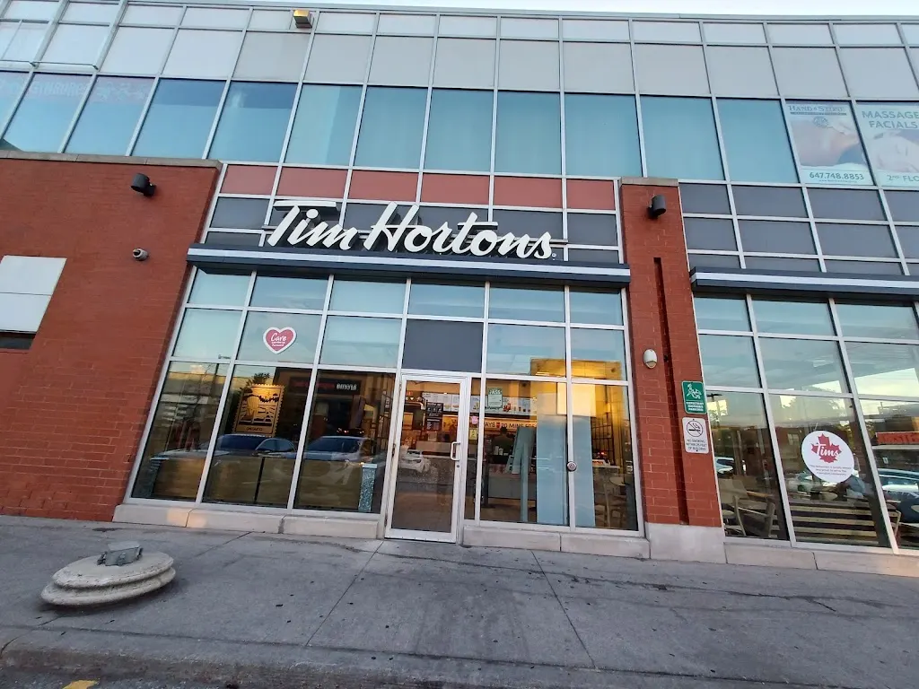 Tim Hortons storefront and interior at 85 Laird Dr, East York, ON