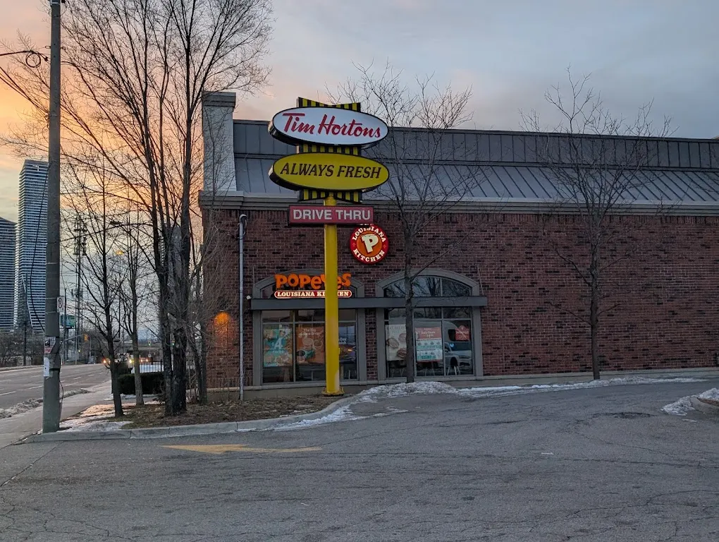 Tim Hortons storefront and interior at 152 Park Lawn Rd, Etobicoke, ON