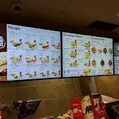 Tim Hortons storefront and interior at 250 The East Mall, Etobicoke, ON