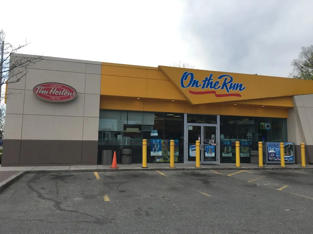 Tim Hortons storefront and interior at 250 The Queensway, Etobicoke, ON
