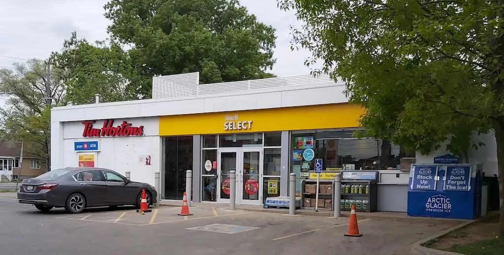 Tim Hortons storefront and interior at 435 Browns Line, Etobicoke, ON