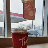 Tim Hortons storefront and interior at 1345 Martin Grove Rd, Etobicoke, ON