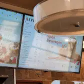 Tim Hortons storefront and interior at 23 Lindsay St, Fenelon Falls, ON