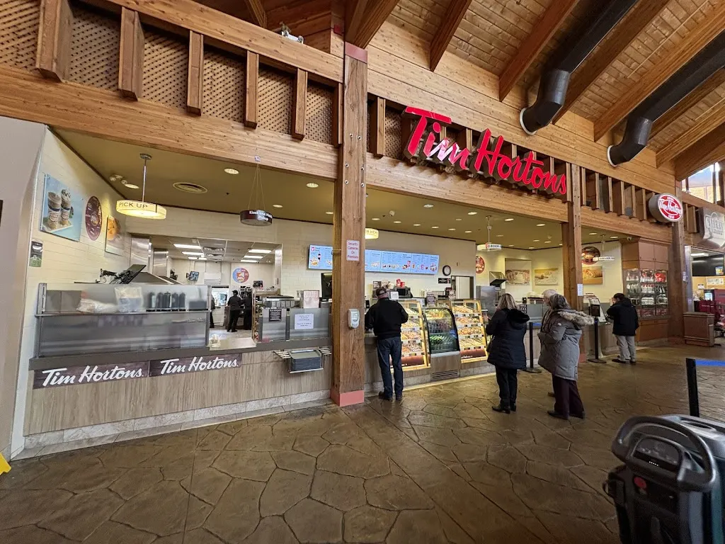 Tim Hortons storefront and interior at 424 South Service Rd, Grimsby, ON