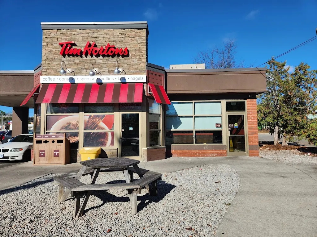 Tim Hortons storefront and interior at 28 Wellington St East, Guelph, ON