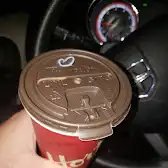 Tim Hortons storefront and interior at 28 Wellington St East, Guelph, ON