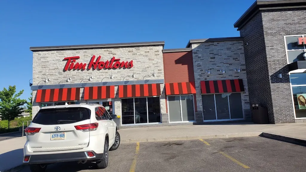 Tim Hortons storefront and interior at 158 Clair Rd E, Guelph, ON