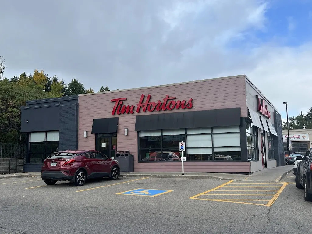 Tim Hortons storefront and interior at 715 Wellington St, Guelph, ON