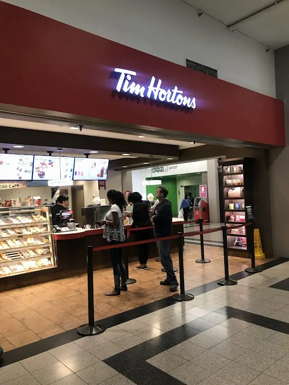 Tim Hortons storefront and interior at 35 King St East, Hamilton, ON