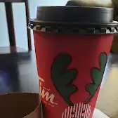 Tim Hortons storefront and interior at 50 Charlton Ave E, Hamilton, ON