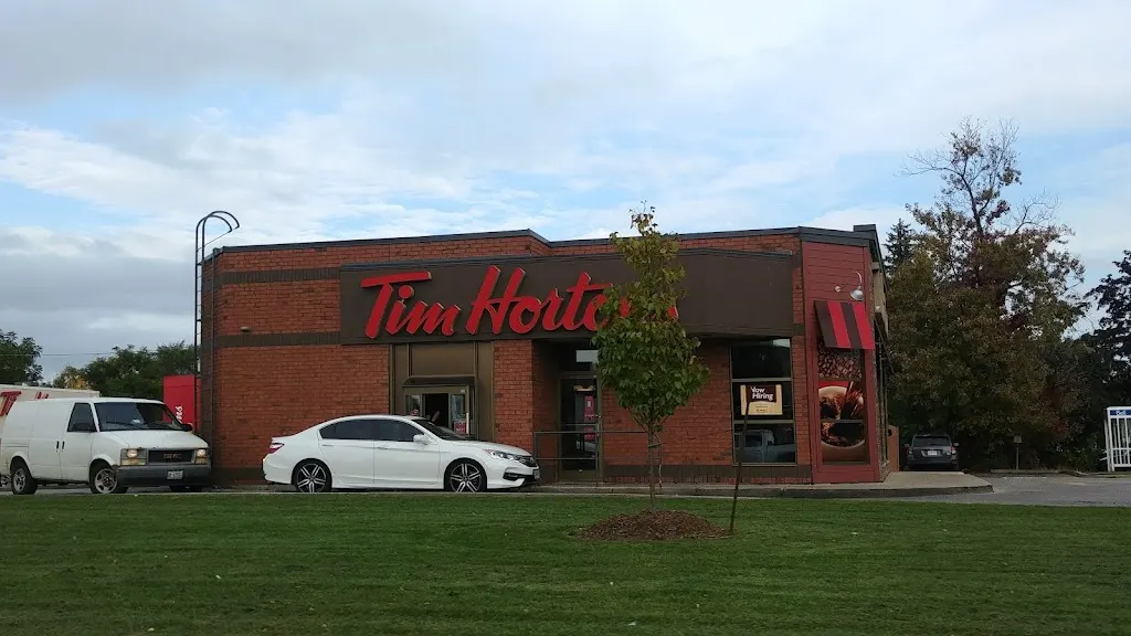 Tim Hortons storefront and interior at 135 Fennell Ave W, Hamilton, ON