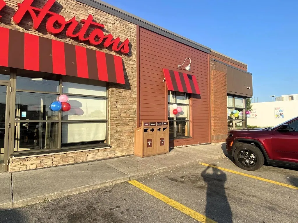 Tim Hortons storefront and interior at 706 Queenston Rd, Hamilton, ON