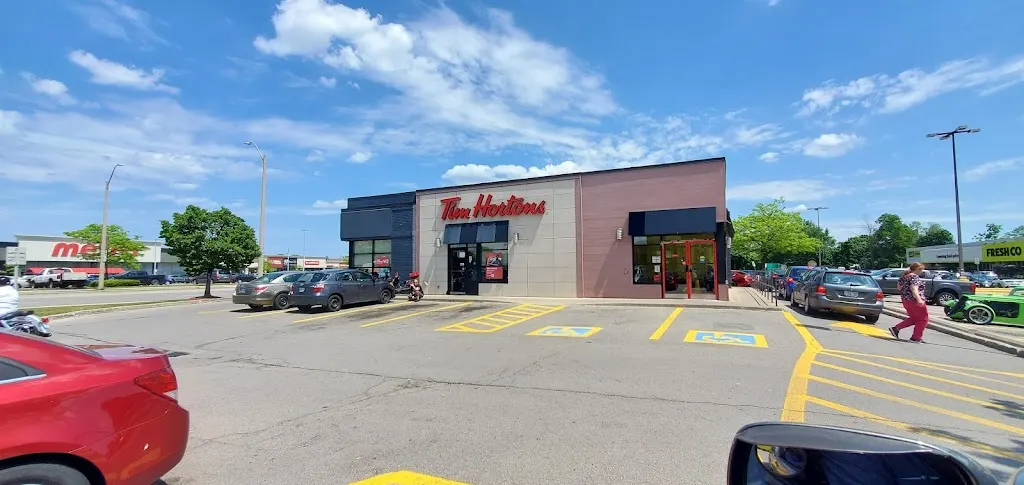 Tim Hortons storefront and interior at 952 Fennell Ave E, Hamilton, ON