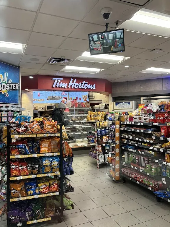Tim Hortons storefront and interior at 1445 Main St West, Hamilton, ON