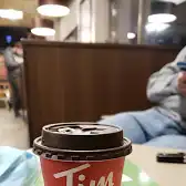 Tim Hortons storefront and interior at 7502 Trafalgar Rd, Hornby, ON