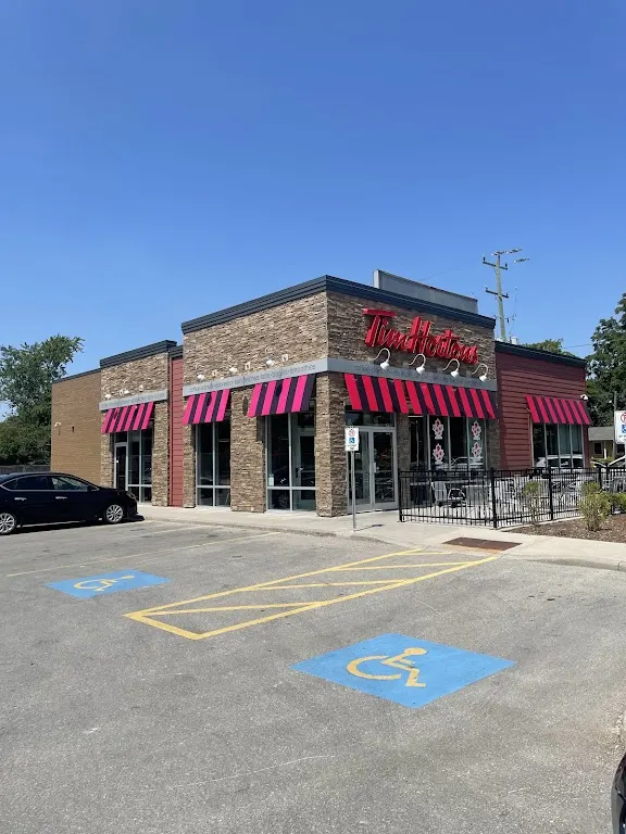 Tim Hortons storefront and interior at 13349 Ilderton Road, Ilderton, ON