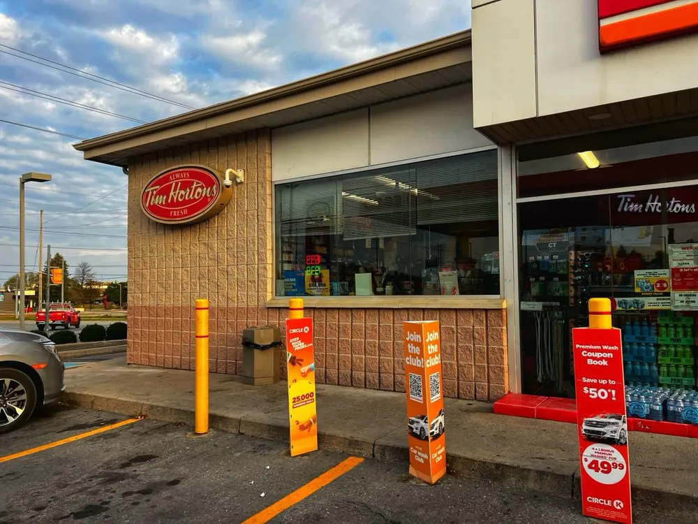Tim Hortons storefront and interior at 1185 Division St, Kingston, ON