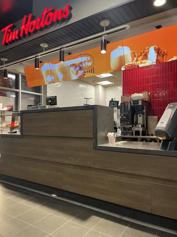 Tim Hortons storefront and interior at 1525 Centennial Dr., Kingston, ON