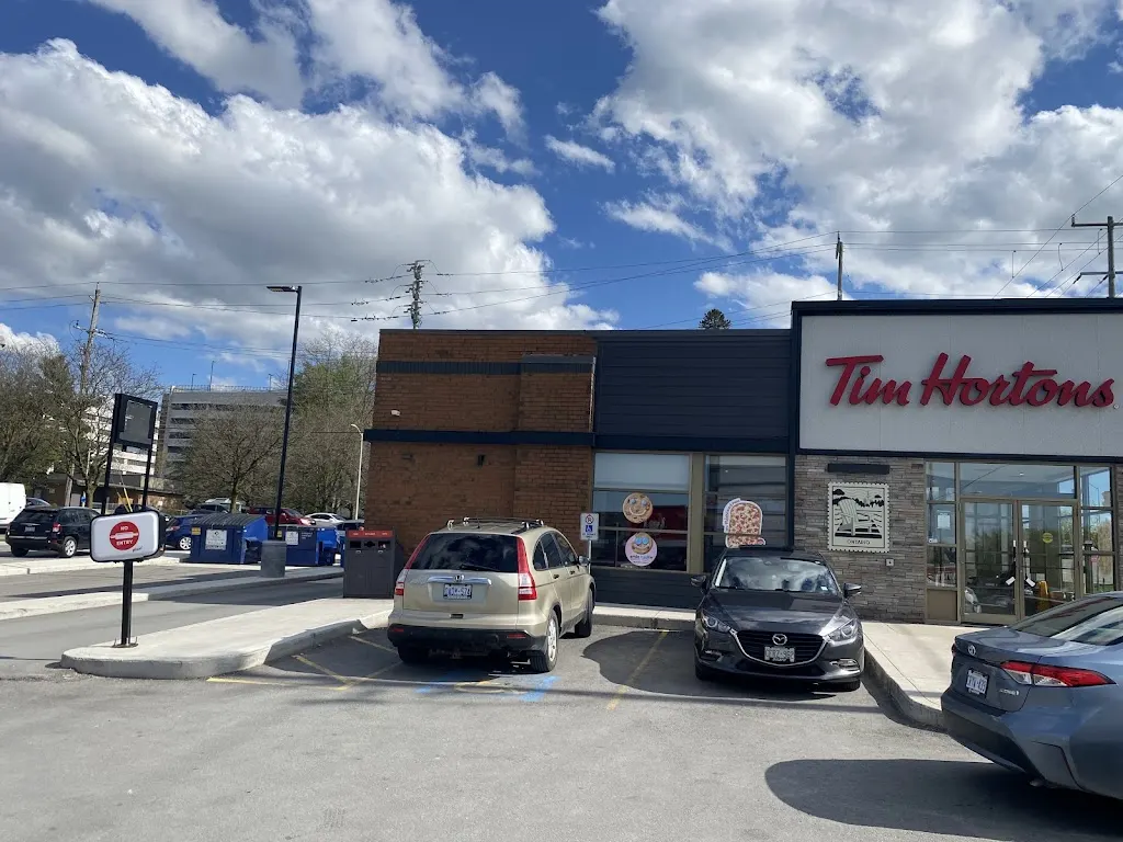 Tim Hortons storefront and interior at 352 Wellington Rd South, London, ON