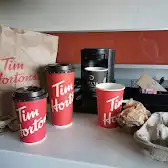 Tim Hortons storefront and interior at 380 Wellington St, London, ON